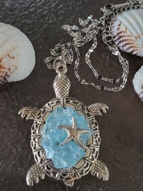 Silver Toned Turtle Pendant Necklace with Light Blue Glass Chips Accent